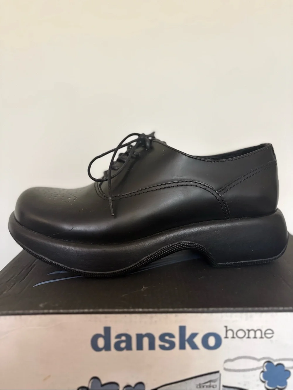 Dansko Black Leather Lace-Up Oxfords with Perforated Toe